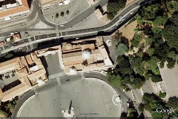 Aerial view of Santa Maria del Popolo, with the Piazza del Popolo to the south and the city walls to the north.