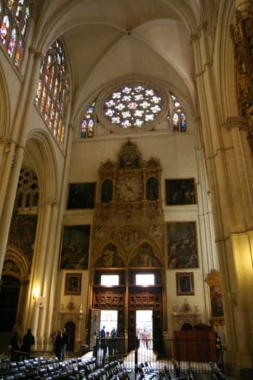 North transept, with entrance doors and rose window.