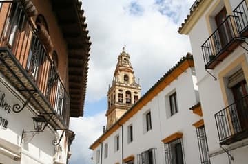View of the minaret-turned-belfry of the Mezquita from the streets of old Cordoba.
