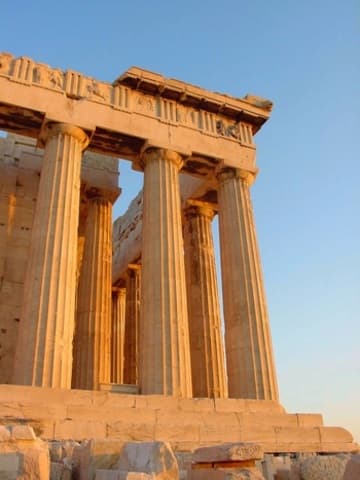 The Parthenon's graceful columns glow at sunset.