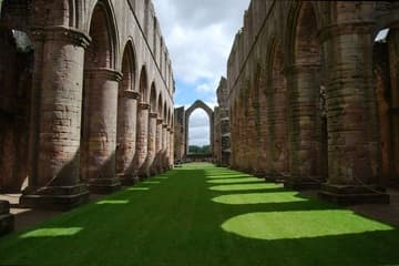 Nave of Fountains Abbey church, looking east.