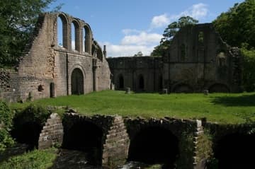 Lay Brothers' Infirmary, built over the water in four vaulted tunnels.