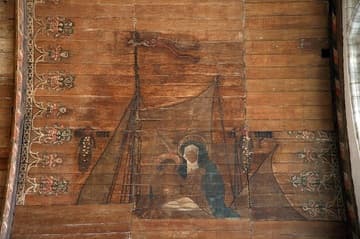 Detail of a Pieta on the painted wooden ceiling (late 15th and early 16th centuries) of the Oude Kerk, Amsterdam, Netherlands.
