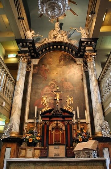 Altar, featuring a painting of the Baptism of Christ (1716) by Jacob de Wit. Museum Amstelkring (Ons' Lieve Heer op Solder, "Our Lord in the Attic"), built 1661 inside a private house. Amsterdam, The Netherlands.