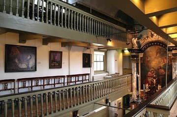 View across the church to the first gallery. Museum Amstelkring (Ons' Lieve Heer op Solder, "Our Lord in the Attic"), built 1661 inside a private house. Amsterdam, The Netherlands.