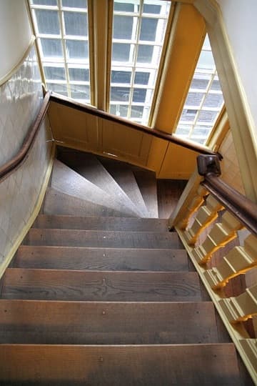 Steep stairs in the Museum Amstelkring (Ons' Lieve Heer op Solder, "Our Lord in the Attic"), built 1661 inside a private house. Amsterdam, The Netherlands.