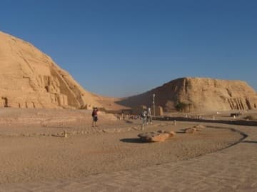 Approach to Abu Simbel, with the Ramses II Temple on the left and the Nefertari Temple on the right.
