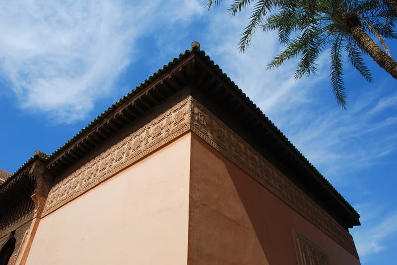 Exterior corner with decorated roofline at the Saadian Tombs, Marrakesh, Morocco.