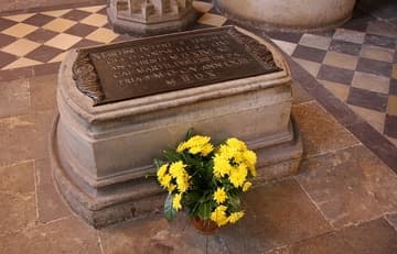 Tomb of Martin Luther, who died in 1546 in his birth town of Eisleben and was buried here four days later. Philipp Melanchthon delivered the funeral oration. The bronze plaque is a replica made in 1892. The abbreviated Latin epitaph roughly translates: "Here lies the body of Martin Luther, Doctor of Divinity, who died at Eisleben, his birthplace, on the 12th of the Calends of March, in the year 1546, when he had lived 63 years, 3 months, and 10 days."