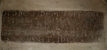 Latin inscription above the "Blood Column" just inside the entrance.