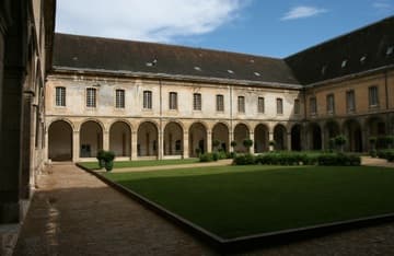 18th-century monumental cloister built on the site of the original Romanesque cloister.