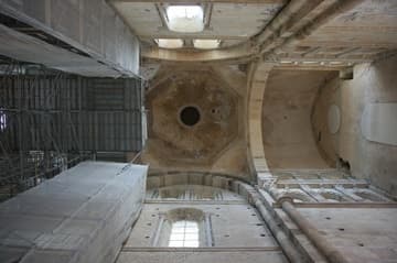 Vault of the great south transept, looking into the cupola of the octagonal Holy Water Belfry. Even from this small part, one can see that the sense of space and light at Cluny Abbey was much greater than other Romanesque churches. On the right is the closed-in north side of the transept, which originally opened into the nave. The lower part of the photo is the west wall of the transept.