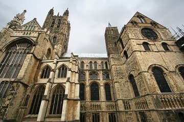 Gothic southwest transept and tower (left) and Romanesque southeast transept and tower (right).