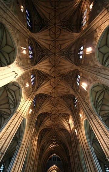 The magnificent lierne vault of Canterbury Cathedral's Gothic nave, completed in 1405 under master mason Henry Yevele.