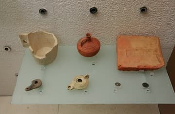 Museum exhibits including oil lamps from the 1st century AD.