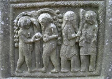 Detail of eastern face of Muirdach's Cross, depicting Adam and Eve and Cain slaying Abel. The cross dates from 900-923 AD and stands 5.5m (16 feet) tall.