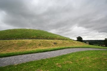 Northwest side of Newgrange, a prehistoric passage tomb and ceremonial chamber dating from about 3200 BC. Boyne River Valley, County Meath, Ireland.