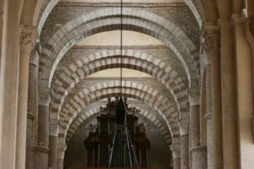 Closer look at the arches of the nave, looking west.