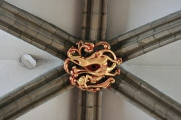 Gilded roof boss on the nave vault (1242).