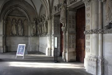 Evening light streams into the Paradise (south porch) of Munster Cathedral. The porch and its sculptures date from 1225-35. View looking northwest.