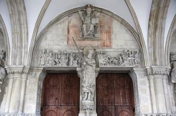 North wall of the porch or Paradise, with Christ in Judgment over the door and St. Paul below. All sculptures date from 1225-35 except Paul, who was replaced after the Anabaptist rebellion in 1540.