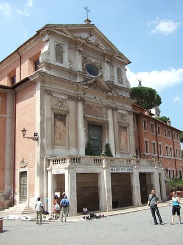 Exterior of the ancient Mamertime Prison, with the 16th-century church of San Giuseppe dei Falegnami above.