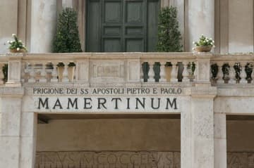 A sign on the exterior proclaims the Mamertime the "prison of the Saints and Apostles Peter and Paul."