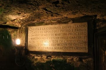 Plaque in the lower room wall.