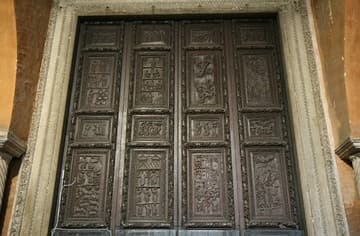 Detail of the ancient wood door in the narthex, which is probably in its original position. A rare and precious survival, it dates from the early 5th century and portrays biblical scenes.