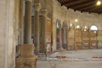 Looking left: outer aisle with 5th-century chapel on the left.