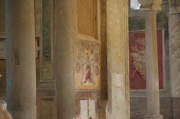 Detail of outer aisle with entrance to chapel.