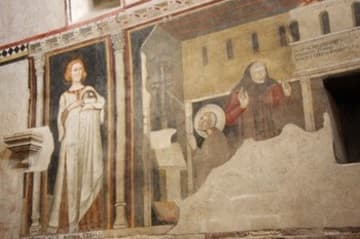 14th-century frescoes of St. Agnes and St. Francis in the nave.
