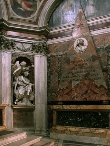 The Chigi Chapel, designed by Raphael in 1513-16. On the right is the tomb of Agostino Chigi (d.1520), with a unique pyramidal design based on ancient Roman models. Bernini added the medallion after 1652. At the same time, he sculpted the celebrated Habakkuk and the Angel (left).