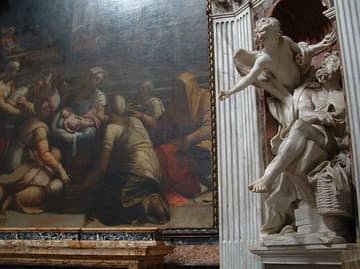 The celebrated sculpture of Habakkuk and the Angel by Bernini (after 1652) and altarpiece of the Nativity of the Virgin by Raphael's rival Sebastiano del Piombo (1530-34) in the Chigi Chapel.