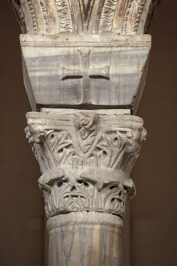 Byzantine capital in the nave of Sant'Apollinare Nuovo, Ravenna, dating from c.500 AD. The columns are from Constantinople and the capitals were made in Greek workshops. The Greek monograms of the workshops can be seen inscribed on many of the capitals.