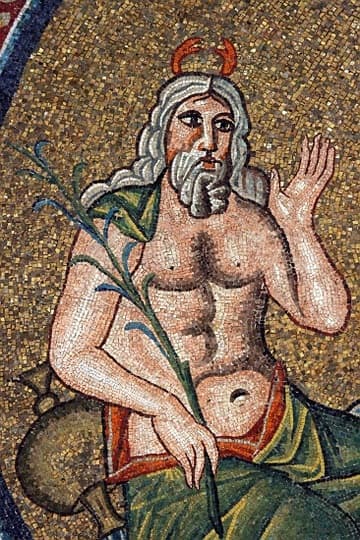 Personification of the River Jordan as a bare-chested, grey-bearded man with lobster claws for horns. He holds a rush in his right hand and sits next to a vase, the symbolic source of the waters in which Jesus is baptized.
