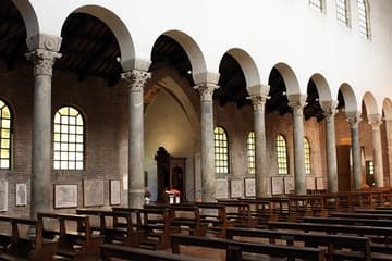 Columns on the north side of San Giovanni Evangelista in Ravenna, looking northeast. The basilica was built c.426-30 by Galla Placidia in fulfillment of a vow. It was badly damaged by bombs in 1944 but rebuilt to its original Byzantine form. Most of the columns and capitals are original.