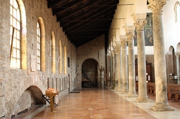North aisle of San Giovanni Evangelista in Ravenna, looking east. The church was built c.426-30 by Galla Placidia. Much of it had to be rebuilt after bomb damage in 1944.