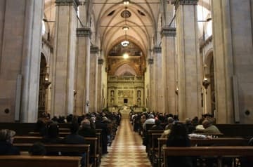 Nave looking east to the Renaissance marble screen around the Holy House, commissioned by Pope Julius II (1503-13) and designed by Bramante.