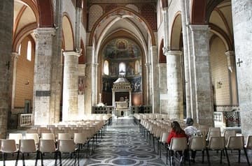 Nave looking east to the apse, with Cosmati pavement dating from before 1227. Cattedrale di Santa Maria (1079-1104), Anagni, Lazio, Italy.