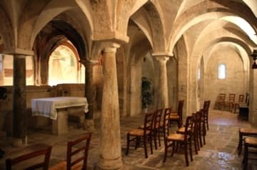 The crypt, with ancient conical pillars that may be from a hippodrome.