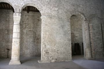 Nave walls, partially filled with in masonry.