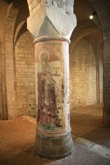 Pillar with a fresco of a saint.