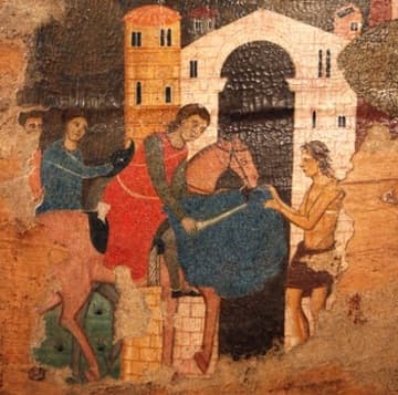 Detail of St. Martin dividing his cloak on the same altarpiece.