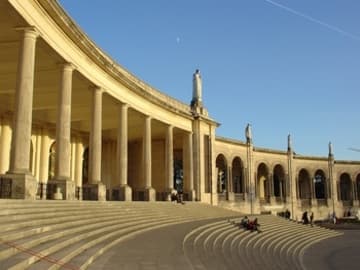 Colonnade around the plaza at sunset.