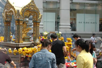 Erawan Shrine with Burberry in the background. The much-revered shrine is in the center of the shopping district.