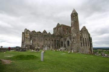 View of the cathedral (mid-13th century) and round tower (early 12th century) from northeast. Rock of Cashel, County Tipperary, Ireland.