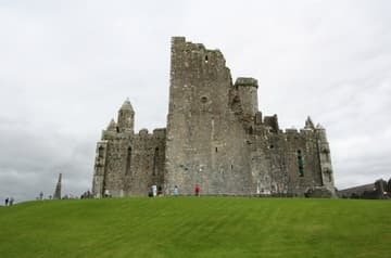 West exterior of the cathedral, mid-13th century. The west end features a fortified tower-house added in the 15th century. Rock of Cashel, County Tipperary, Ireland.