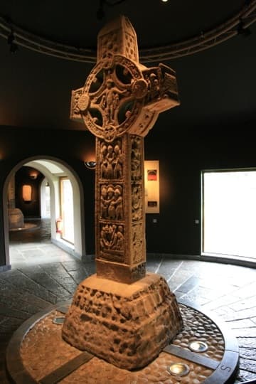 The Cross of the Scriptures, one of the finest high crosses in Ireland. Dating from about 900 AD, it originally stood in front of the cathedral. It stands 13 feet (4m) high and is divided into panels of sculptured biblical scenes.