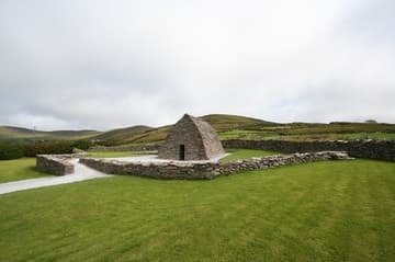Broader view of the Oratory with surrounding low wall.